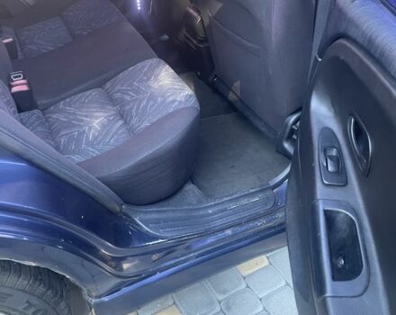 Синий Мицубиси Харизма, объемом двигателя 1.8 л и пробегом 250 тыс. км за 3000 $, фото 8 на Automoto.ua