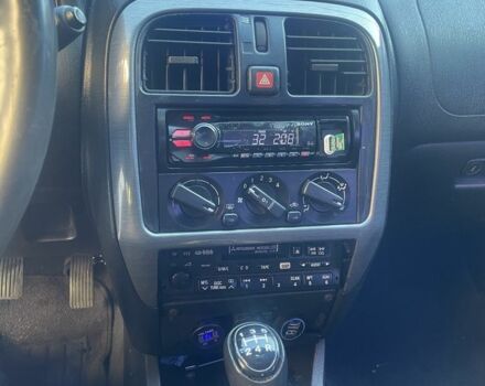 Синий Мицубиси Харизма, объемом двигателя 1.8 л и пробегом 250 тыс. км за 3000 $, фото 7 на Automoto.ua