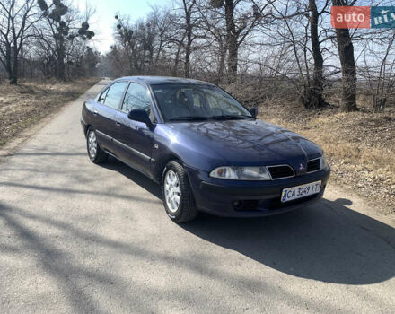 Синий Мицубиси Харизма, объемом двигателя 1.87 л и пробегом 380 тыс. км за 3900 $, фото 4 на Automoto.ua