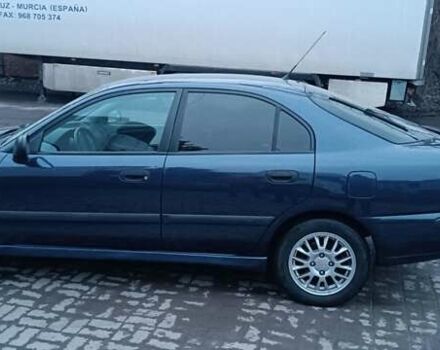 Синий Мицубиси Харизма, объемом двигателя 1.6 л и пробегом 387 тыс. км за 4200 $, фото 6 на Automoto.ua