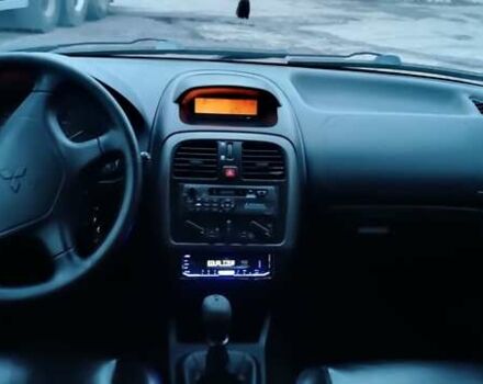 Синий Мицубиси Харизма, объемом двигателя 1.6 л и пробегом 387 тыс. км за 4200 $, фото 4 на Automoto.ua