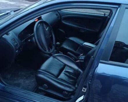 Синий Мицубиси Харизма, объемом двигателя 1.6 л и пробегом 387 тыс. км за 4200 $, фото 2 на Automoto.ua