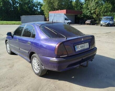 Синий Мицубиси Харизма, объемом двигателя 1.87 л и пробегом 270 тыс. км за 3000 $, фото 2 на Automoto.ua
