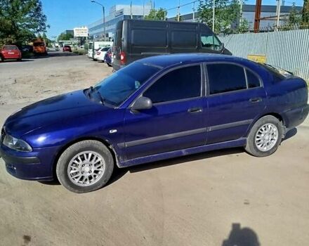 Синий Мицубиси Харизма, объемом двигателя 1.87 л и пробегом 270 тыс. км за 3000 $, фото 1 на Automoto.ua