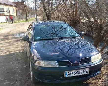 Синій Міцубісі Харизма, об'ємом двигуна 1.6 л та пробігом 214 тис. км за 2300 $, фото 1 на Automoto.ua