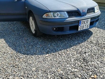 Синій Міцубісі Харизма, об'ємом двигуна 1.9 л та пробігом 300 тис. км за 2564 $, фото 1 на Automoto.ua