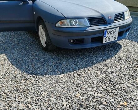 Синий Мицубиси Харизма, объемом двигателя 1.9 л и пробегом 300 тыс. км за 2588 $, фото 1 на Automoto.ua