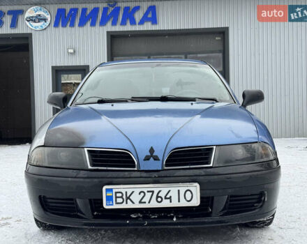 Синий Мицубиси Харизма, объемом двигателя 1.6 л и пробегом 300 тыс. км за 1999 $, фото 1 на Automoto.ua