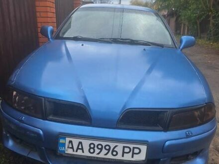 Синий Мицубиси Харизма, объемом двигателя 1.83 л и пробегом 230 тыс. км за 2200 $, фото 1 на Automoto.ua