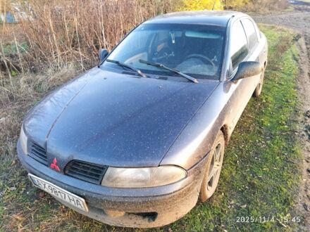 Синий Мицубиси Харизма, объемом двигателя 1.6 л и пробегом 300 тыс. км за 1800 $, фото 1 на Automoto.ua