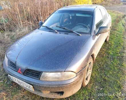 Синий Мицубиси Харизма, объемом двигателя 1.6 л и пробегом 300 тыс. км за 1800 $, фото 1 на Automoto.ua