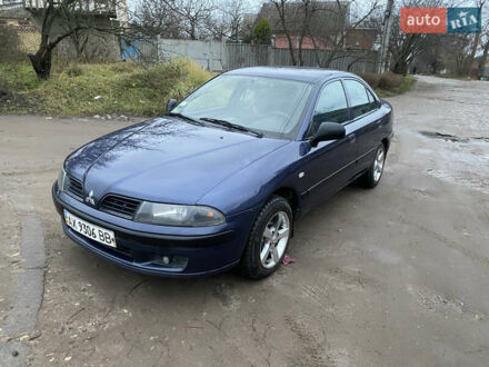 Синий Мицубиси Харизма, объемом двигателя 1.6 л и пробегом 170 тыс. км за 3000 $, фото 1 на Automoto.ua