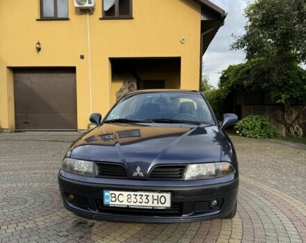 Синий Мицубиси Харизма, объемом двигателя 1.8 л и пробегом 275 тыс. км за 3000 $, фото 1 на Automoto.ua