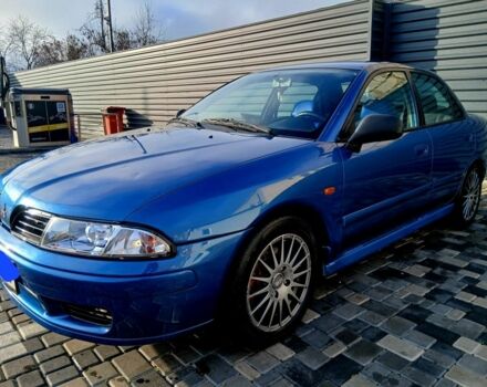 Синий Мицубиси Харизма, объемом двигателя 1.8 л и пробегом 311 тыс. км за 3699 $, фото 1 на Automoto.ua