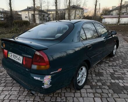 Зелений Міцубісі Харизма, об'ємом двигуна 1.6 л та пробігом 357 тис. км за 1499 $, фото 1 на Automoto.ua