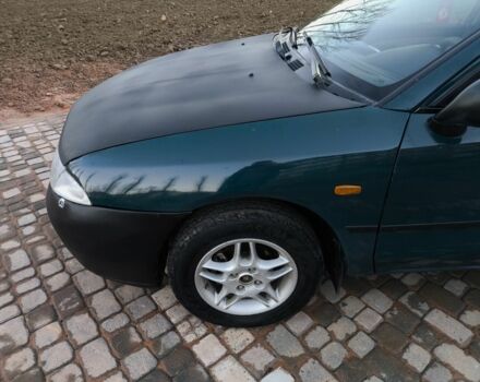 Зелений Міцубісі Харизма, об'ємом двигуна 1.6 л та пробігом 357 тис. км за 1499 $, фото 19 на Automoto.ua