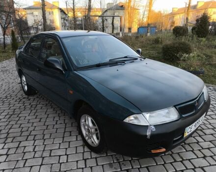 Зелений Міцубісі Харизма, об'ємом двигуна 1.6 л та пробігом 357 тис. км за 1499 $, фото 8 на Automoto.ua