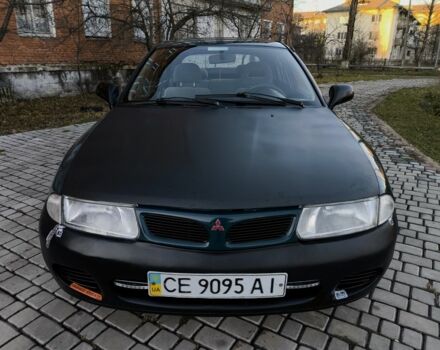 Зелений Міцубісі Харизма, об'ємом двигуна 1.6 л та пробігом 357 тис. км за 1499 $, фото 10 на Automoto.ua