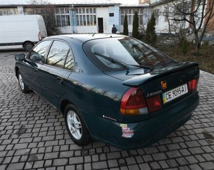 Зелений Міцубісі Харизма, об'ємом двигуна 1.6 л та пробігом 357 тис. км за 1499 $, фото 13 на Automoto.ua