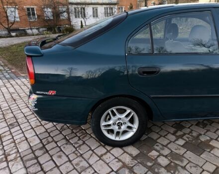 Зелений Міцубісі Харизма, об'ємом двигуна 1.6 л та пробігом 357 тис. км за 1499 $, фото 18 на Automoto.ua