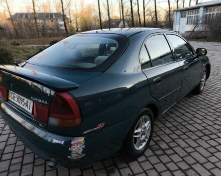 Зелений Міцубісі Харизма, об'ємом двигуна 1.6 л та пробігом 357 тис. км за 1499 $, фото 9 на Automoto.ua