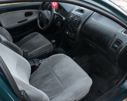 Зелений Міцубісі Харизма, об'ємом двигуна 1.6 л та пробігом 357 тис. км за 1499 $, фото 5 на Automoto.ua