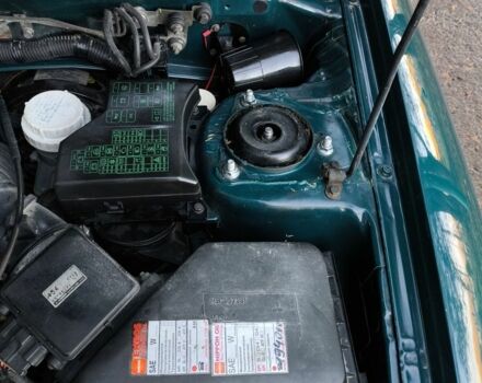 Зелений Міцубісі Харизма, об'ємом двигуна 1.6 л та пробігом 357 тис. км за 1499 $, фото 14 на Automoto.ua