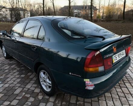 Зелений Міцубісі Харизма, об'ємом двигуна 1.6 л та пробігом 357 тис. км за 1499 $, фото 2 на Automoto.ua