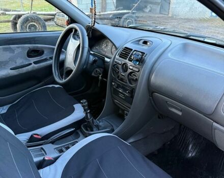 Зеленый Мицубиси Харизма, объемом двигателя 1 л и пробегом 475 тыс. км за 1299 $, фото 7 на Automoto.ua