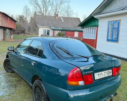 Зеленый Мицубиси Харизма, объемом двигателя 1 л и пробегом 475 тыс. км за 1299 $, фото 6 на Automoto.ua