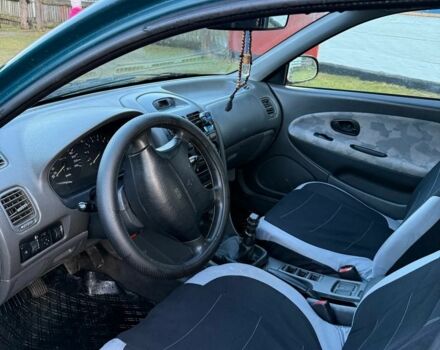 Зеленый Мицубиси Харизма, объемом двигателя 1 л и пробегом 475 тыс. км за 1299 $, фото 8 на Automoto.ua