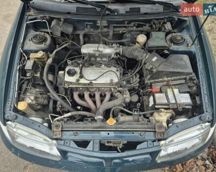 Зелений Міцубісі Харизма, об'ємом двигуна 1.8 л та пробігом 621 тис. км за 1399 $, фото 6 на Automoto.ua