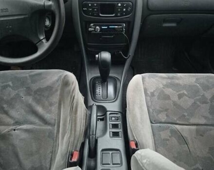 Зелений Міцубісі Харизма, об'ємом двигуна 1.8 л та пробігом 621 тис. км за 1399 $, фото 10 на Automoto.ua