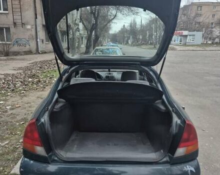 Зелений Міцубісі Харизма, об'ємом двигуна 1.8 л та пробігом 621 тис. км за 1399 $, фото 14 на Automoto.ua