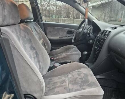 Зелений Міцубісі Харизма, об'ємом двигуна 1.8 л та пробігом 621 тис. км за 1399 $, фото 8 на Automoto.ua