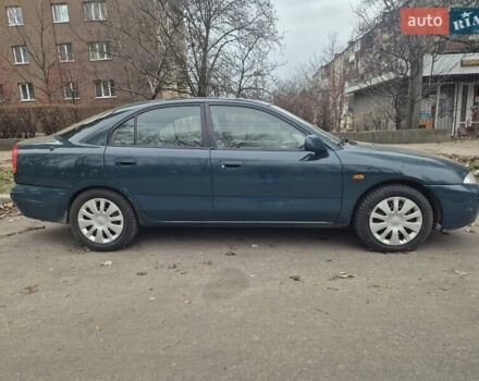 Зелений Міцубісі Харизма, об'ємом двигуна 1.8 л та пробігом 621 тис. км за 1399 $, фото 2 на Automoto.ua