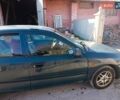Зеленый Мицубиси Харизма, объемом двигателя 1.6 л и пробегом 350 тыс. км за 1250 $, фото 11 на Automoto.ua