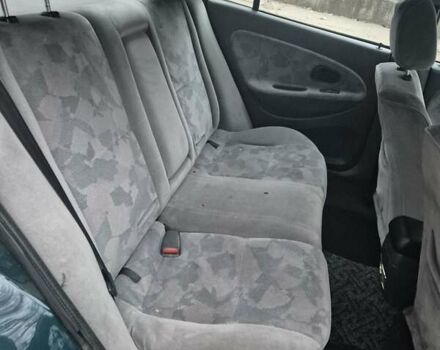 Зелений Міцубісі Харизма, об'ємом двигуна 1.8 л та пробігом 621 тис. км за 1399 $, фото 12 на Automoto.ua