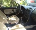 Зеленый Мицубиси Харизма, объемом двигателя 1.83 л и пробегом 351 тыс. км за 2500 $, фото 7 на Automoto.ua