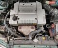 Зеленый Мицубиси Харизма, объемом двигателя 1.83 л и пробегом 255 тыс. км за 3500 $, фото 14 на Automoto.ua