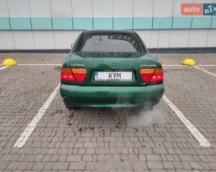 Зеленый Мицубиси Харизма, объемом двигателя 1.83 л и пробегом 255 тыс. км за 3500 $, фото 7 на Automoto.ua