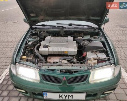 Зеленый Мицубиси Харизма, объемом двигателя 1.83 л и пробегом 255 тыс. км за 3500 $, фото 15 на Automoto.ua