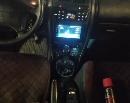 Зеленый Мицубиси Харизма, объемом двигателя 1.83 л и пробегом 255 тыс. км за 3500 $, фото 23 на Automoto.ua