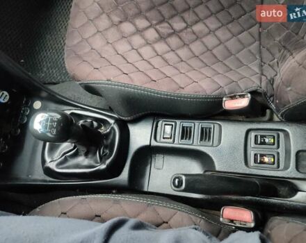 Зеленый Мицубиси Харизма, объемом двигателя 1.83 л и пробегом 255 тыс. км за 3500 $, фото 9 на Automoto.ua