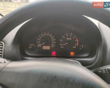 Зеленый Мицубиси Харизма, объемом двигателя 1.83 л и пробегом 255 тыс. км за 3500 $, фото 12 на Automoto.ua