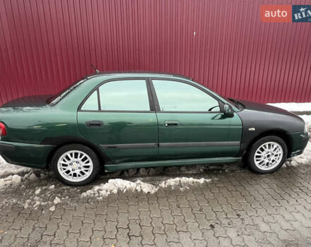 Зелений Міцубісі Харизма, об'ємом двигуна 1.8 л та пробігом 314 тис. км за 2000 $, фото 5 на Automoto.ua