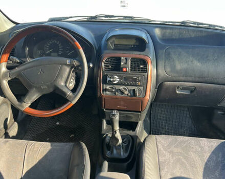 Зелений Міцубісі Харизма, об'ємом двигуна 1.8 л та пробігом 314 тис. км за 2000 $, фото 10 на Automoto.ua