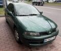 Зеленый Мицубиси Харизма, объемом двигателя 1.8 л и пробегом 300 тыс. км за 1400 $, фото 1 на Automoto.ua