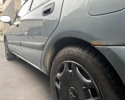 Зеленый Мицубиси Харизма, объемом двигателя 1.6 л и пробегом 211 тыс. км за 3200 $, фото 4 на Automoto.ua