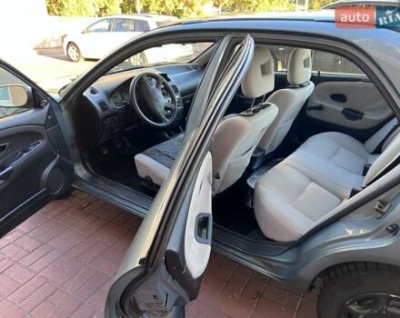 Зеленый Мицубиси Харизма, объемом двигателя 1.6 л и пробегом 193 тыс. км за 3456 $, фото 7 на Automoto.ua